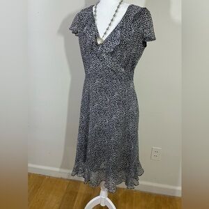 Danny & Nicole sz 6 dress black ditsy print. Layers of sheer fabric